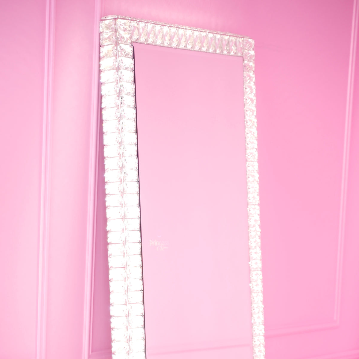 Elysian Mirror - full-length crystal mirror against a pink wall