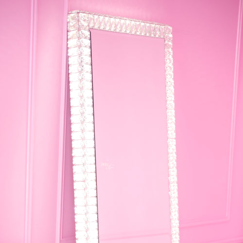 Elysian Mirror - full-length crystal mirror against a pink wall
